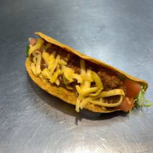 Chili and BBQ onions on a taco